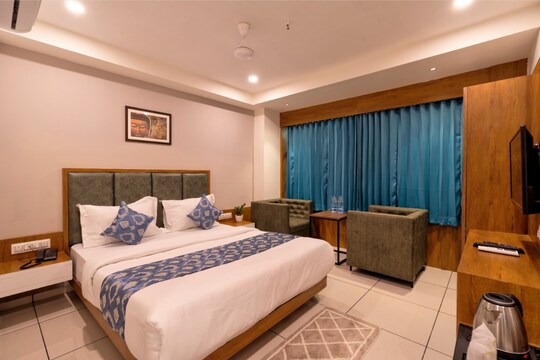 A softly-lit hotel suite